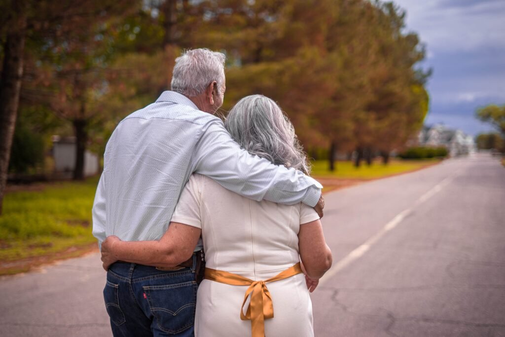 Long-term relationships: Five Powerful Ways to spice it up 3 Elderly couple holding hands and walking down a road in long-term relationships